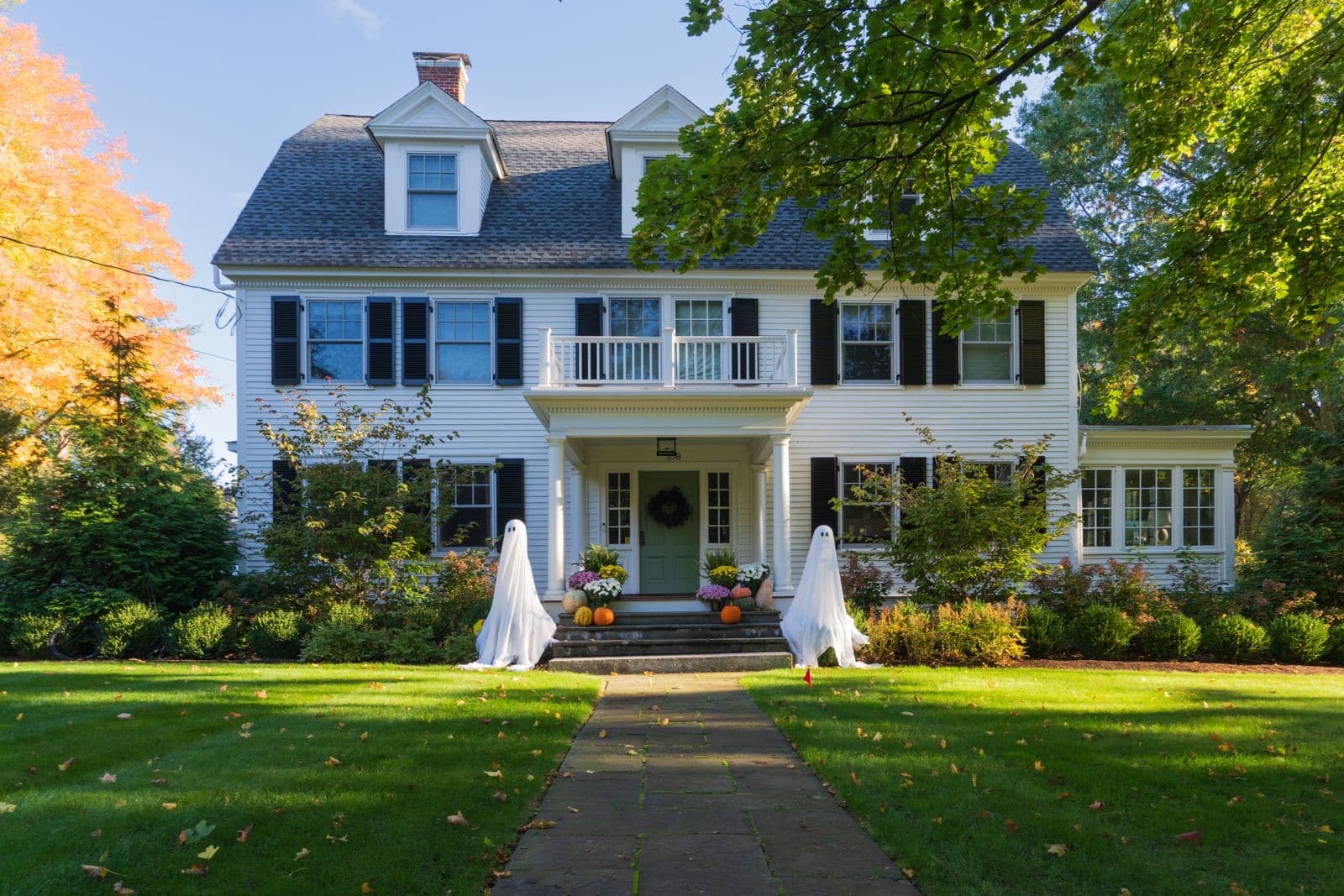 Elegant New England home with fall foliage