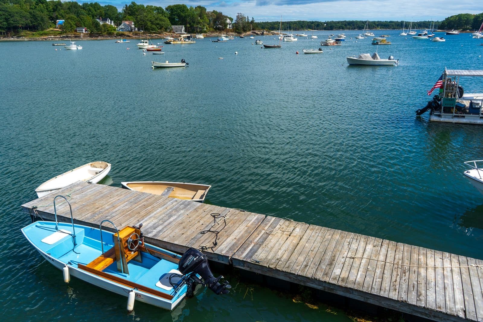 Picturesque harbor with boats and a wooden dock