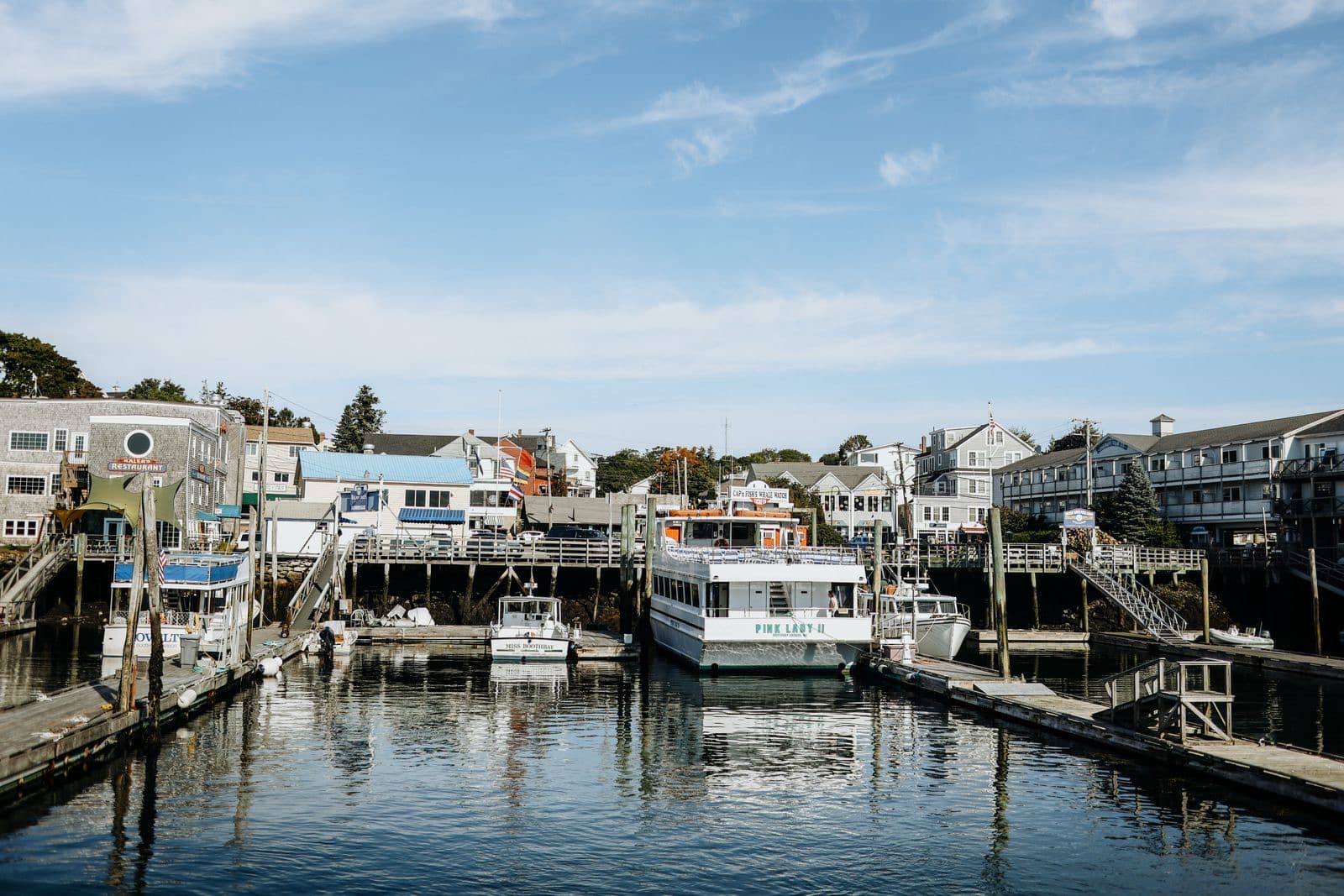 Harbor with boats docked at a port on a clear day